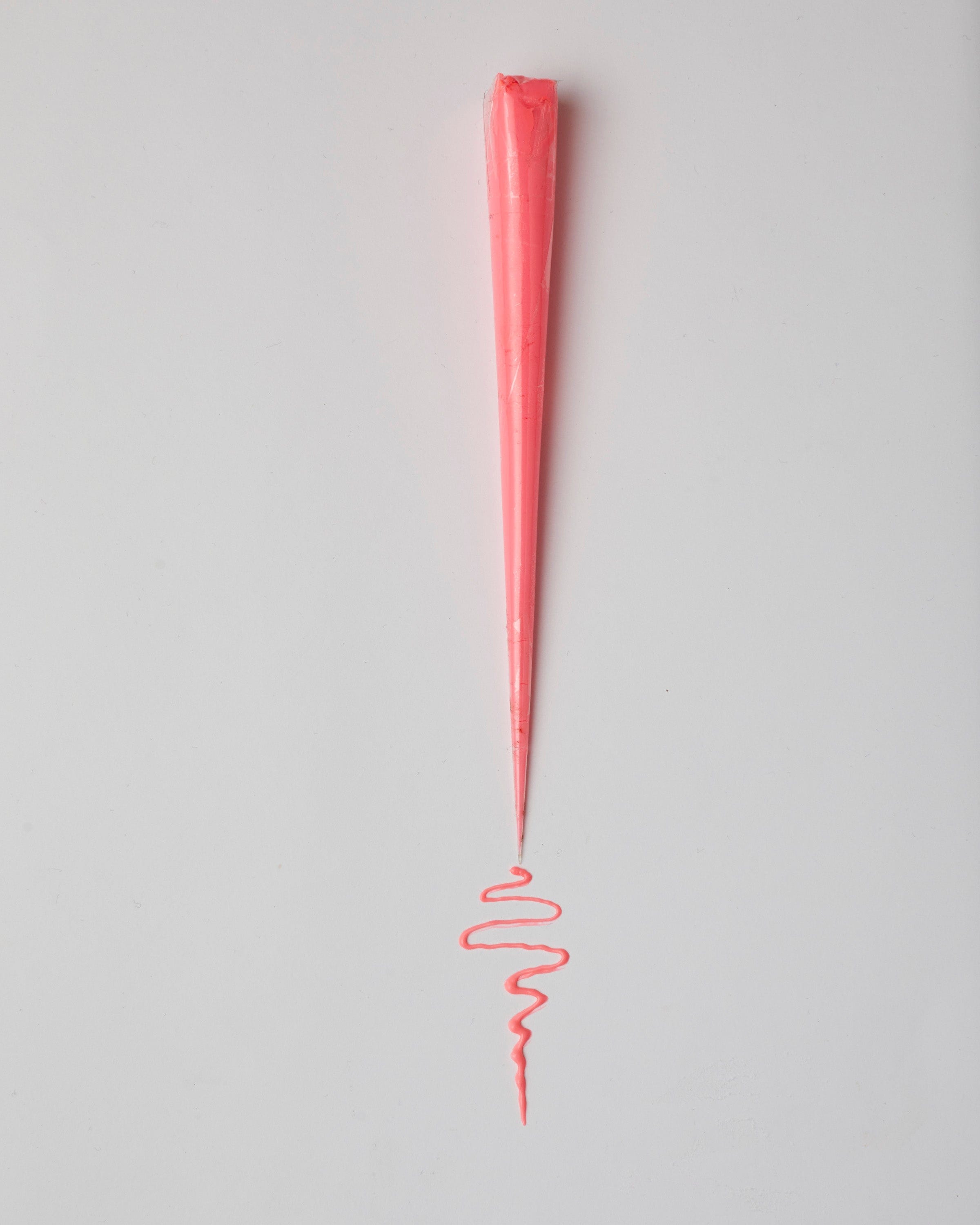 Neon pink henna cone