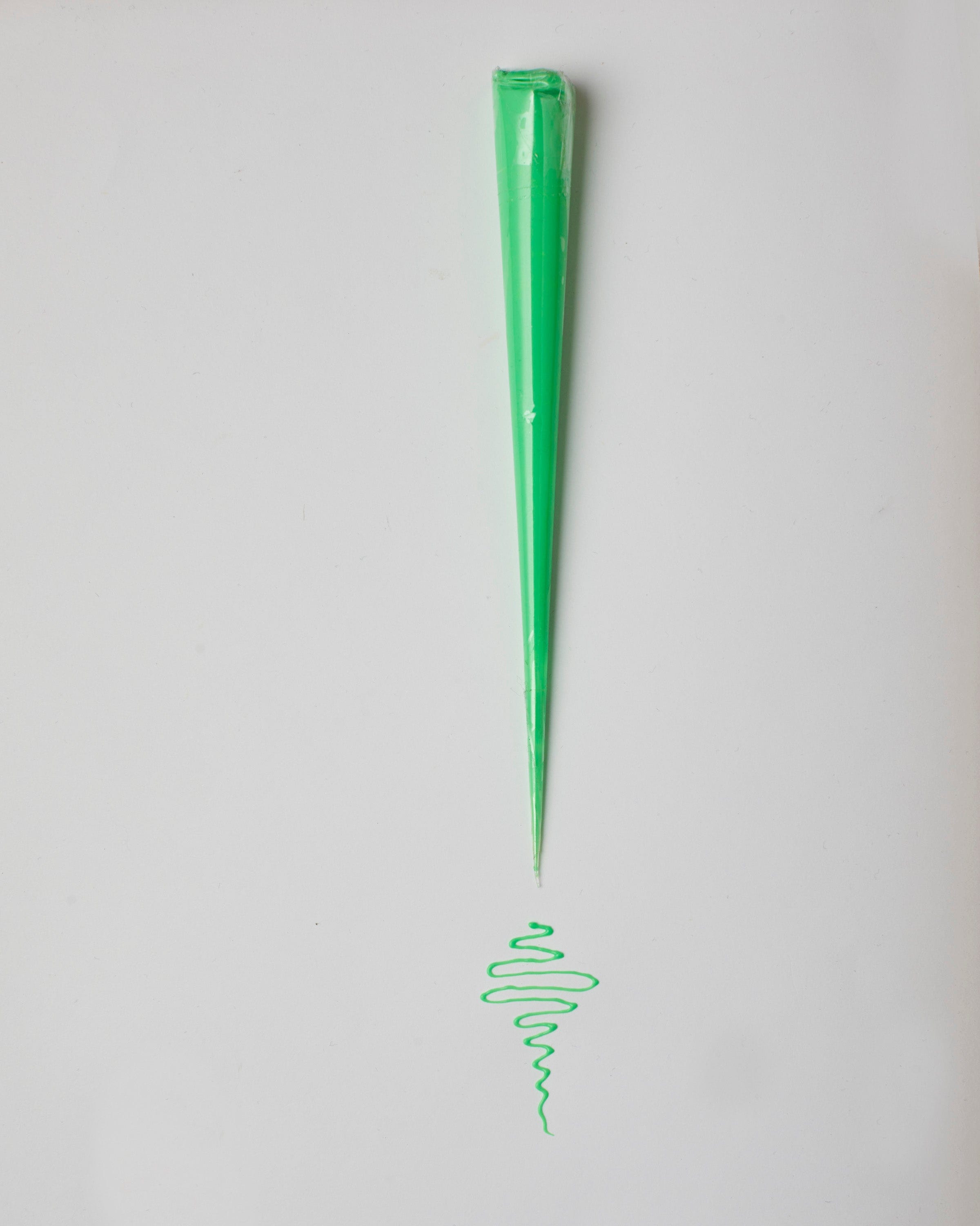 Neon green henna cone